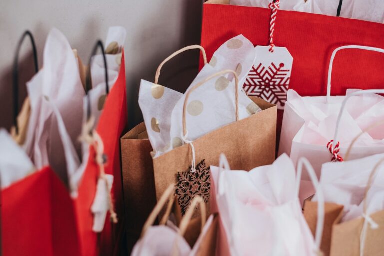 Christmas gift bags symbolizing the overwhelm of holiday shopping